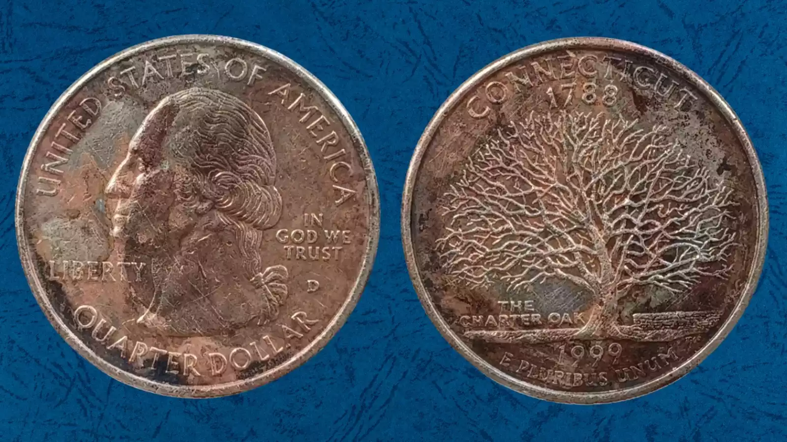 1999 State Quarter with missing clad layer showing copper-colored surface compared to standard silver-gray clad quarter